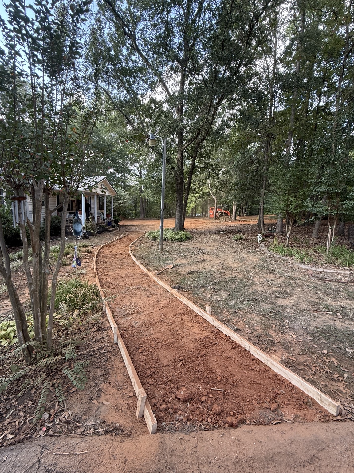 Concrete walkway forms prepared for a pour